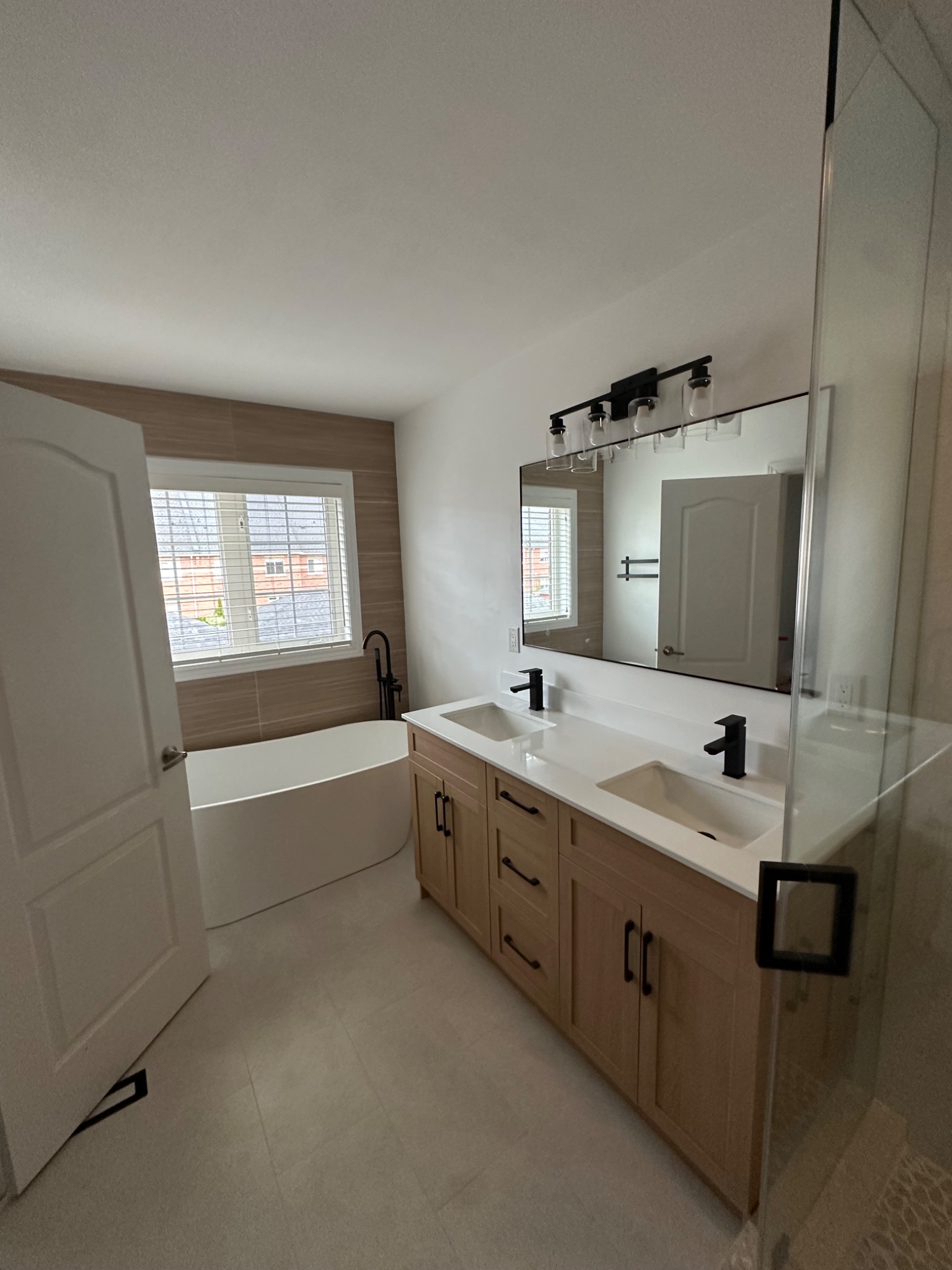 Completed bathroom with bathtub