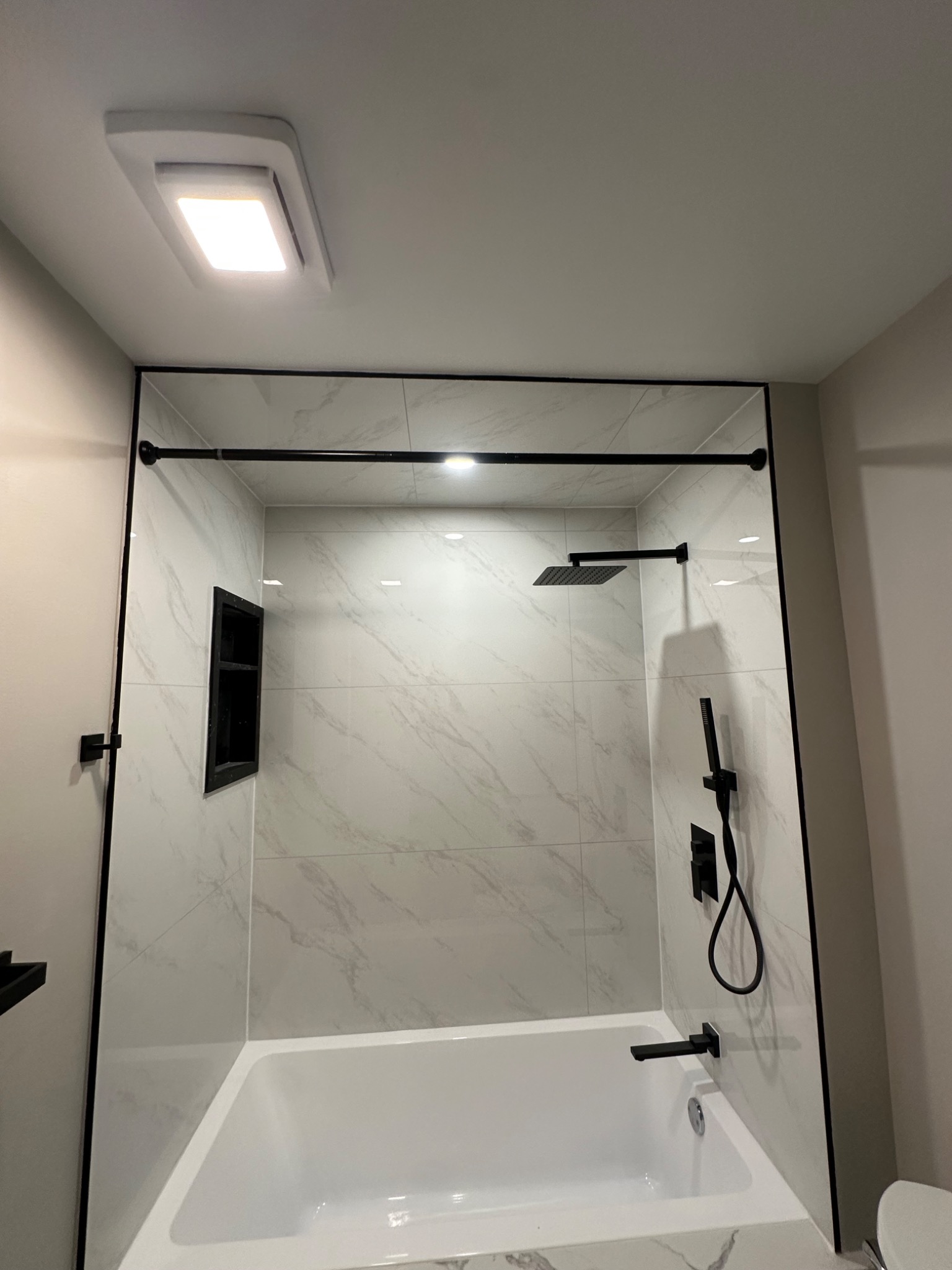 Completed tiled tub and shower